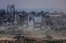 Displaced Palestinians leave one of Gaza's main hospitals after weeks of being isolated by fighting