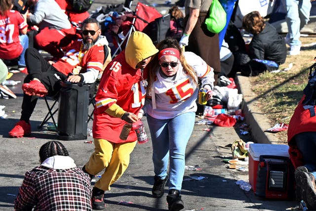 <p>Fans leave the area after shots were fired after the celebration of the Kansas City Chiefs winning Super Bowl LVIII</p>