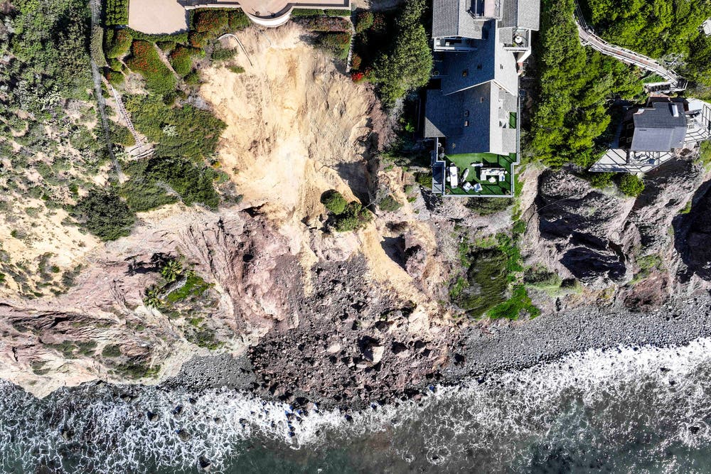 Pictures show multi-million dollar mansion on edge of cliff after ...