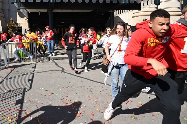 <p>People flee after shots were fired near the Kansas City Chiefs' Super Bowl LVIII victory parade on 14 February 14 2024, in Kansas City, Missouri</p>