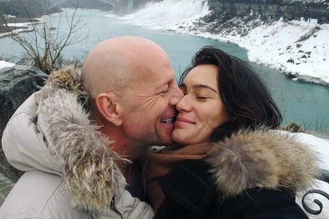 <p>Bruce Willis and his wife Emma photographed in 2010 </p>