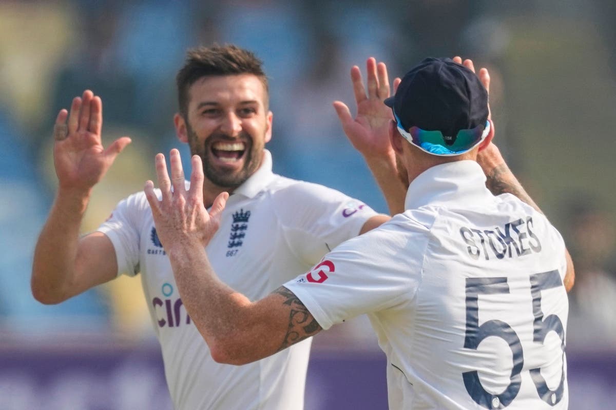 Mark Wood takes two wickets on England recall before India pair steady ship
