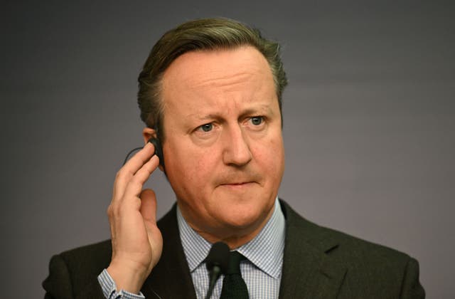<p>David Cameron calls Vladimir Putin an ‘aggressive dictator’ during diplomatic visit to Warsaw.</p>