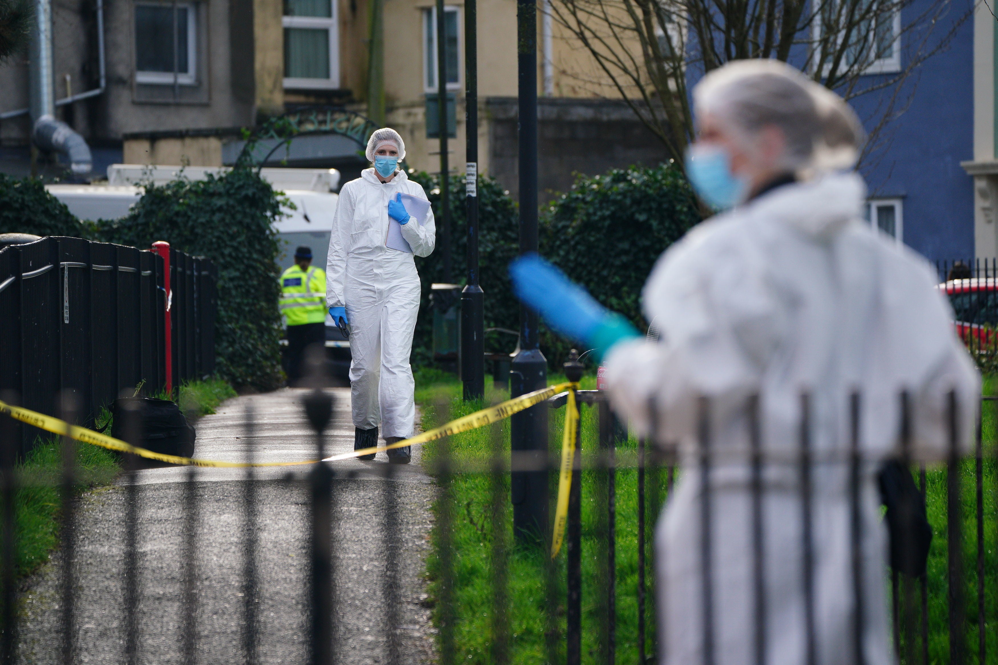 Police and forensic officers at Rawnsley Park near to the scene in the St Philips area of Bristol where a 16-year-old boy has died after being stabbed on Wednesday evening