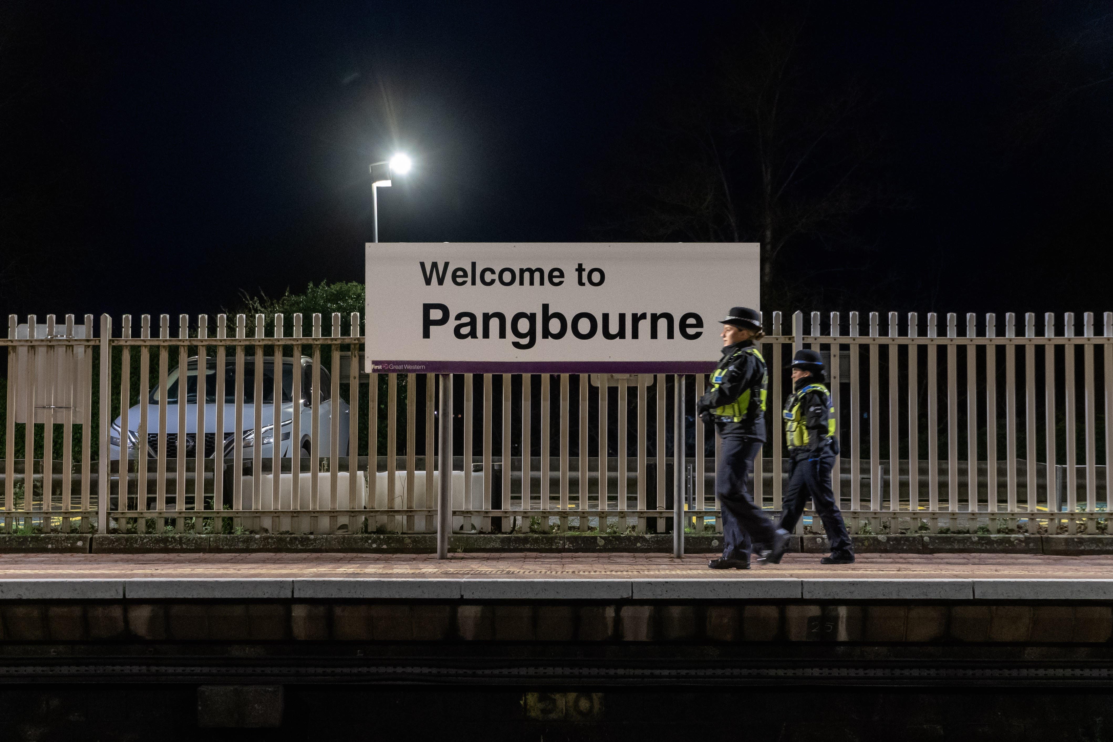 Police officers at Pangbourne station (James Street/PA)