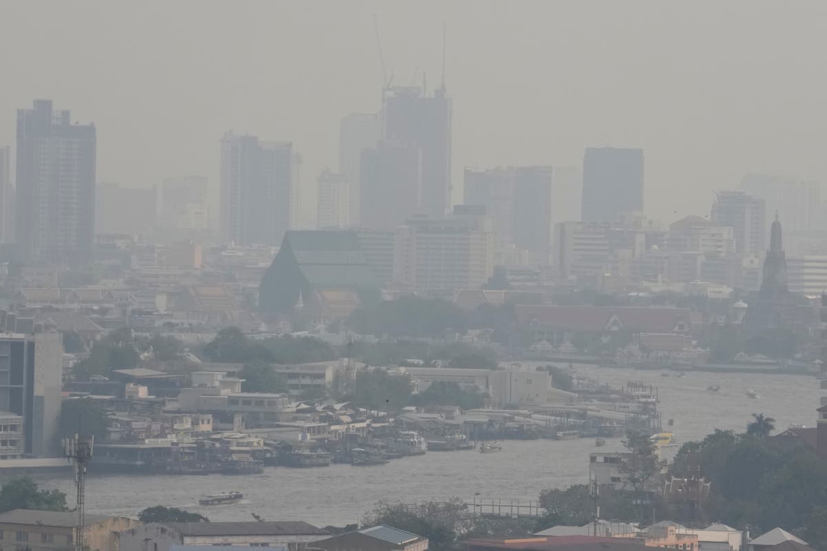 Thai workers told to stay at home as toxic smog engulfs city | The ...