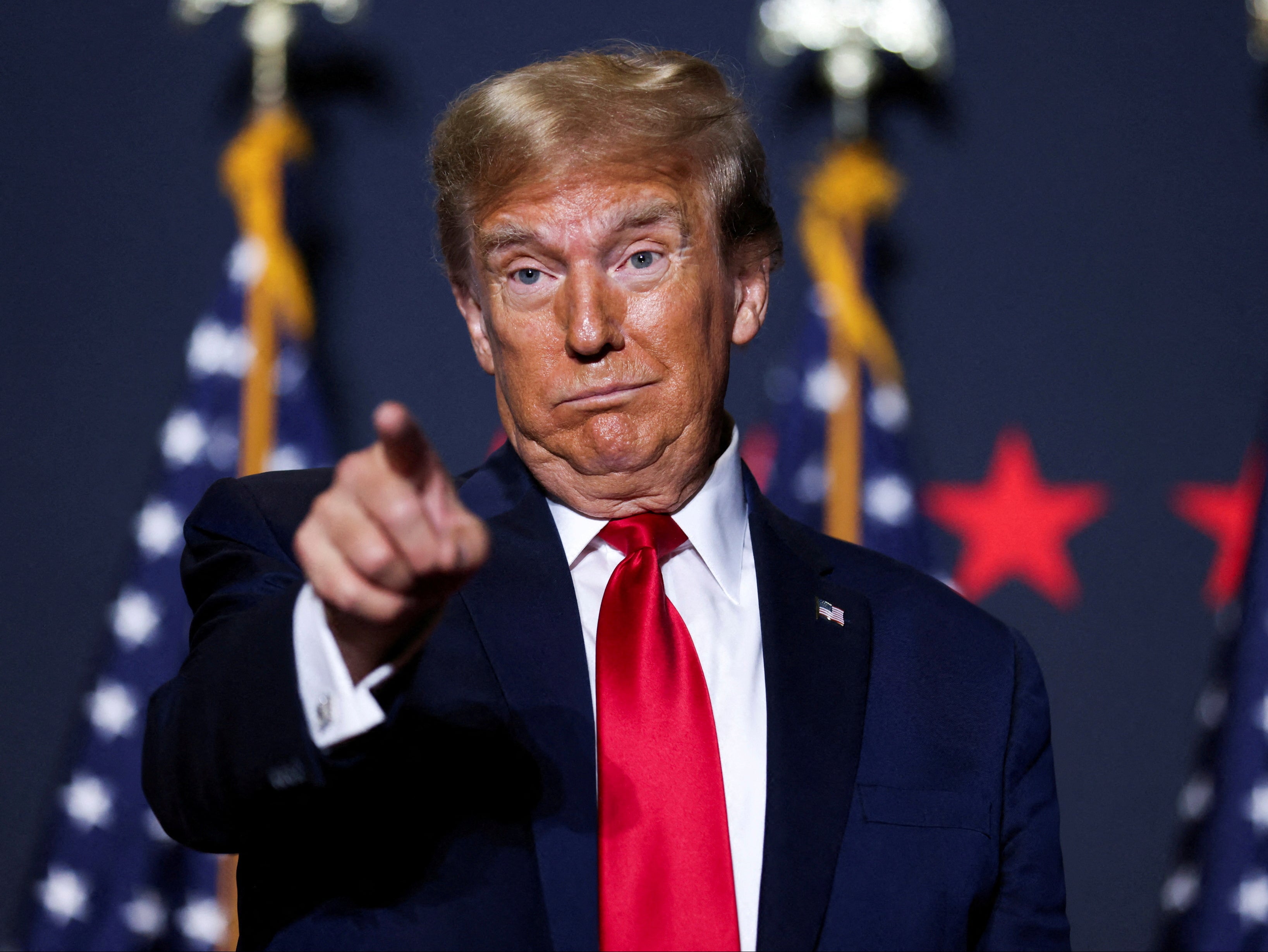 <p>Donald Trump speaking at a campaign event ahead of the Republican presidential primary election in North Charleston, South Carolina, on 14 February 2024</p>