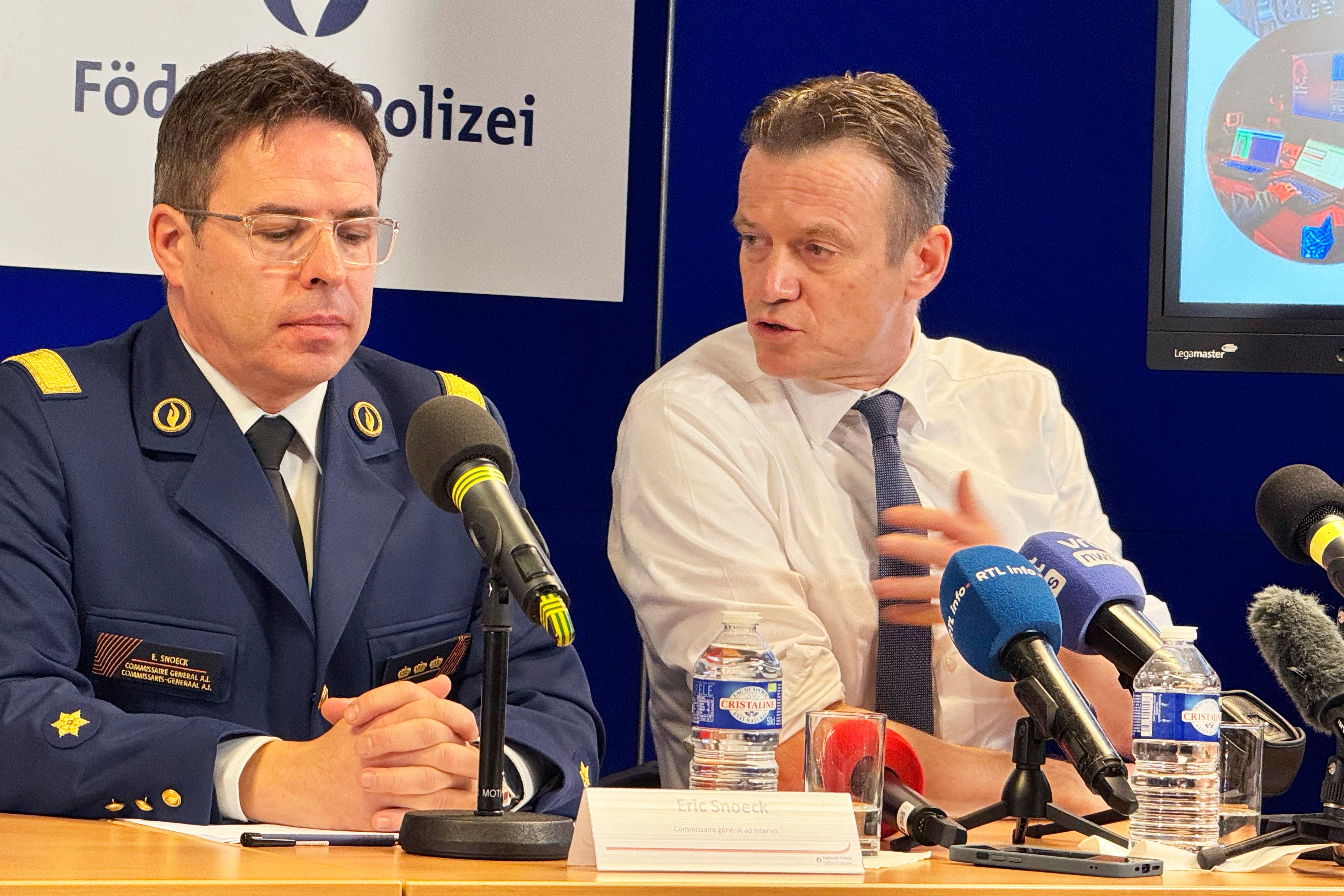 Belgium’s Federal Police Commissioner General Eric Snoek, left, and Belgian Justice Minister Paul Van Tigchelt