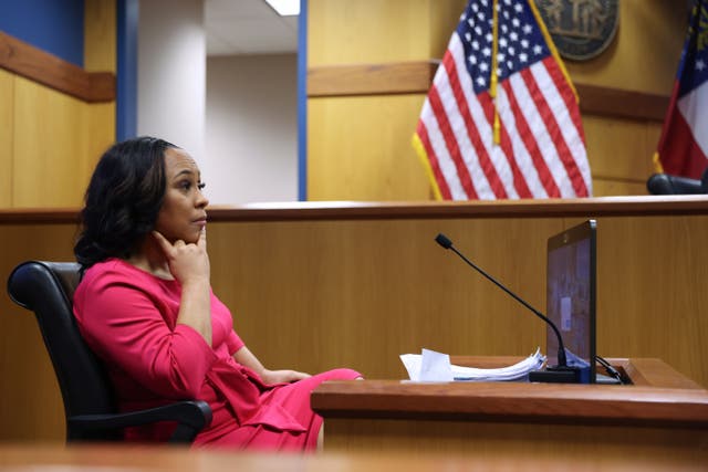 <p>Fulton County District Attorney Fani Willis testifies in a Georgia hearing on 15 February. </p>