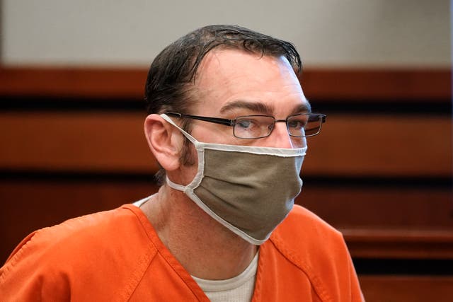 <p>James Crumbley, father of Ethan Crumbley, a teenager accused of killing four students in a shooting at Oxford High School, appears in court for a preliminary examination on involuntary manslaughter charges in Rochester Hills, Michigan in February 2022 </p>
