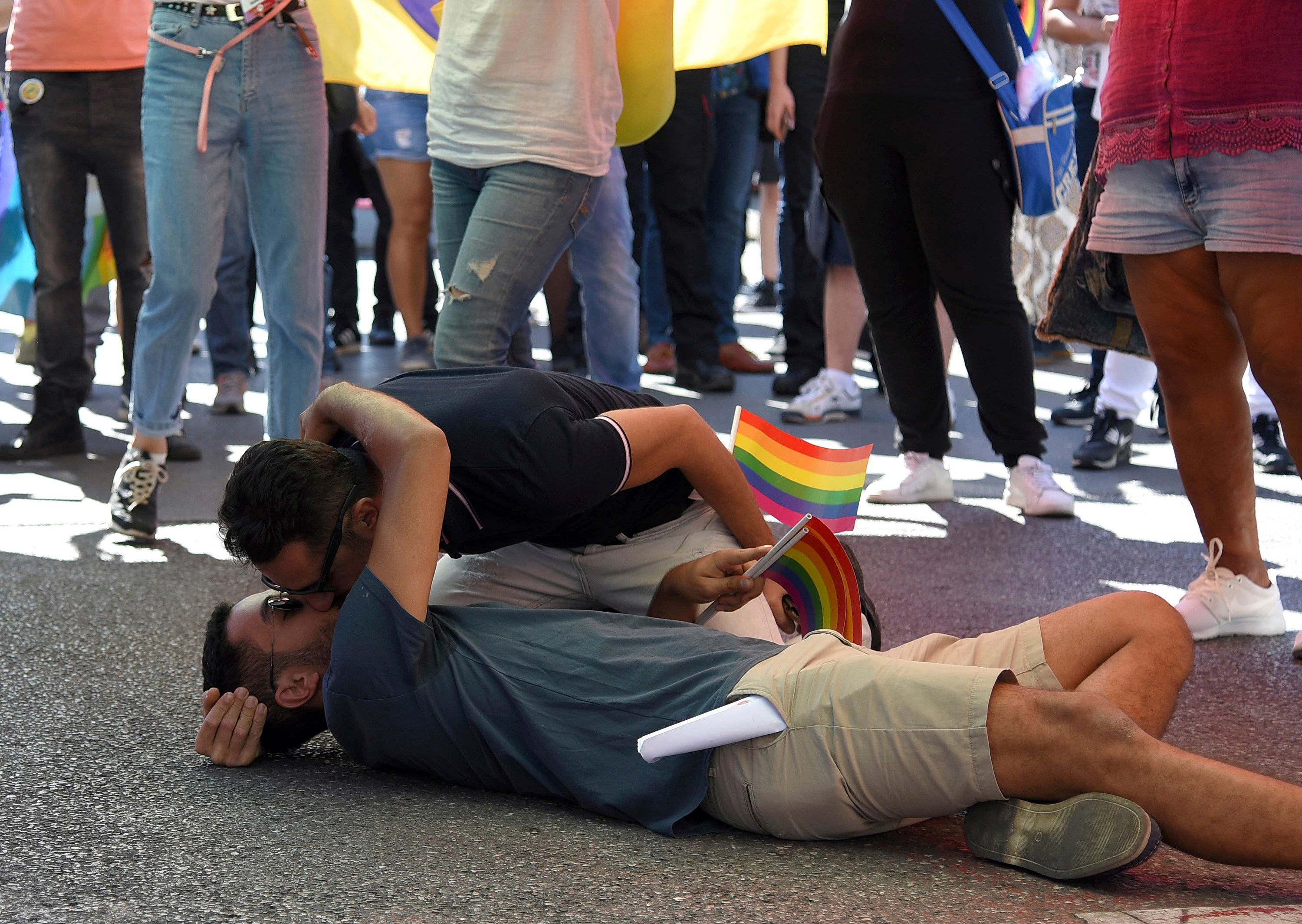 FILE Men kiss during gay pride march in Podgorica, Montenegro