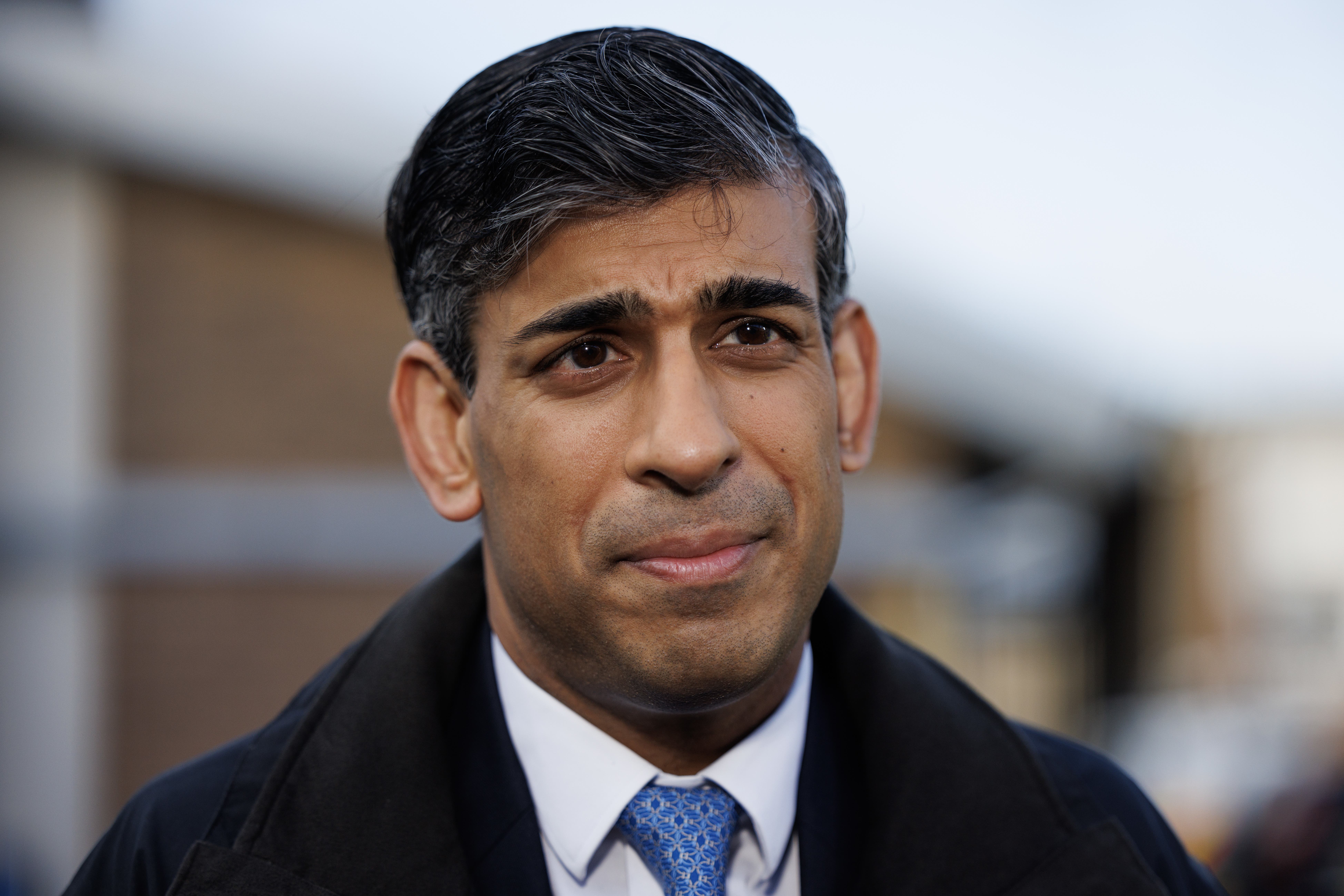 Prime Minister Rishi Sunak speaking to the media while visiting Harlow Police Station in Essex (Dan Kitwood/PA)