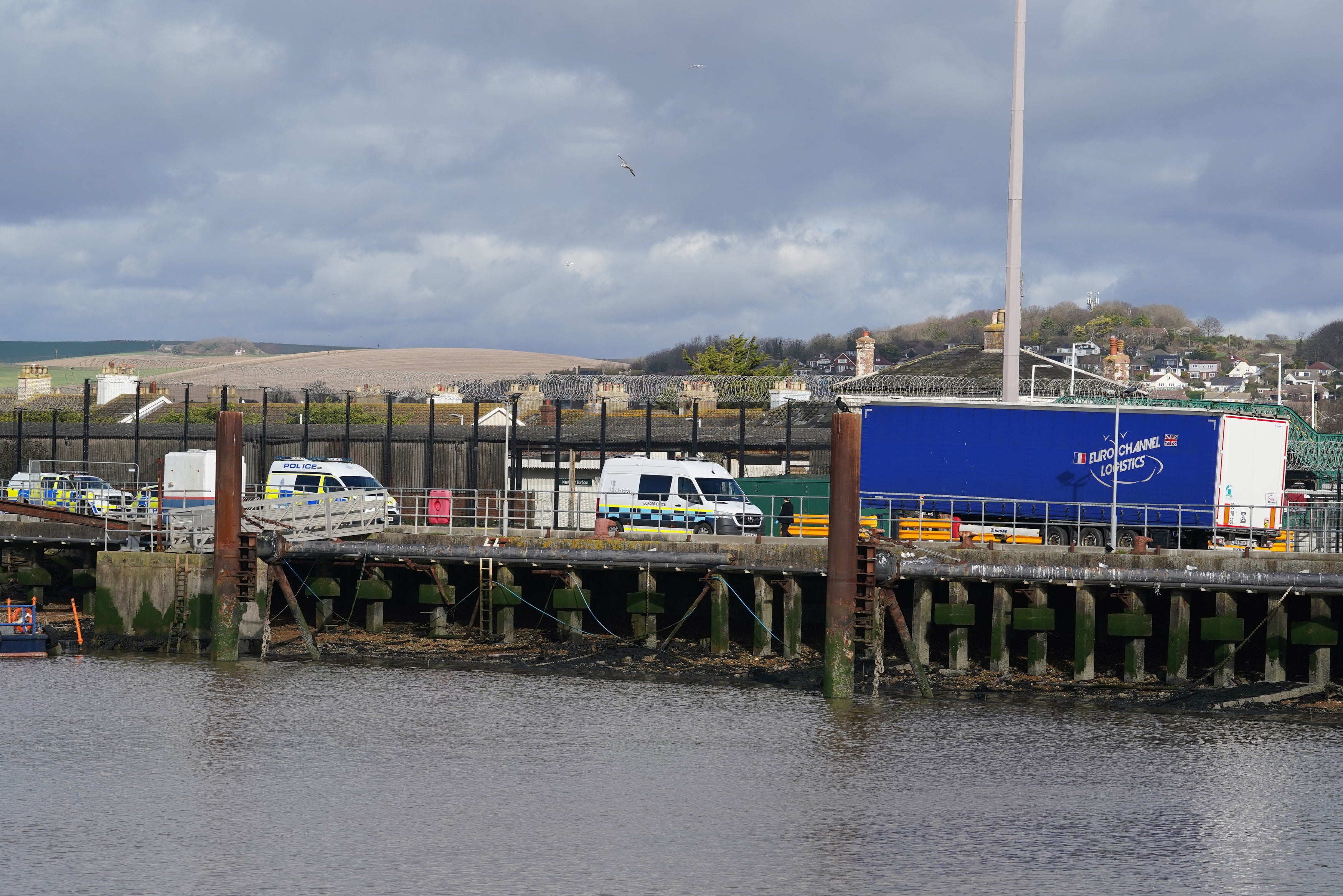 The scene at Newhaven ferry port after migrants have been found in the back of a lorry at port in East Sussex amid a large emergency services presence.