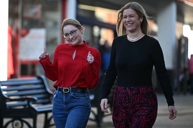 <p>Generation X-in-the-box: Gen Kitchen (left), the new 28-year-old Wellingborough MP, with  campaign coordinator Ellie Reeves, after Labour’s by-election win</p>