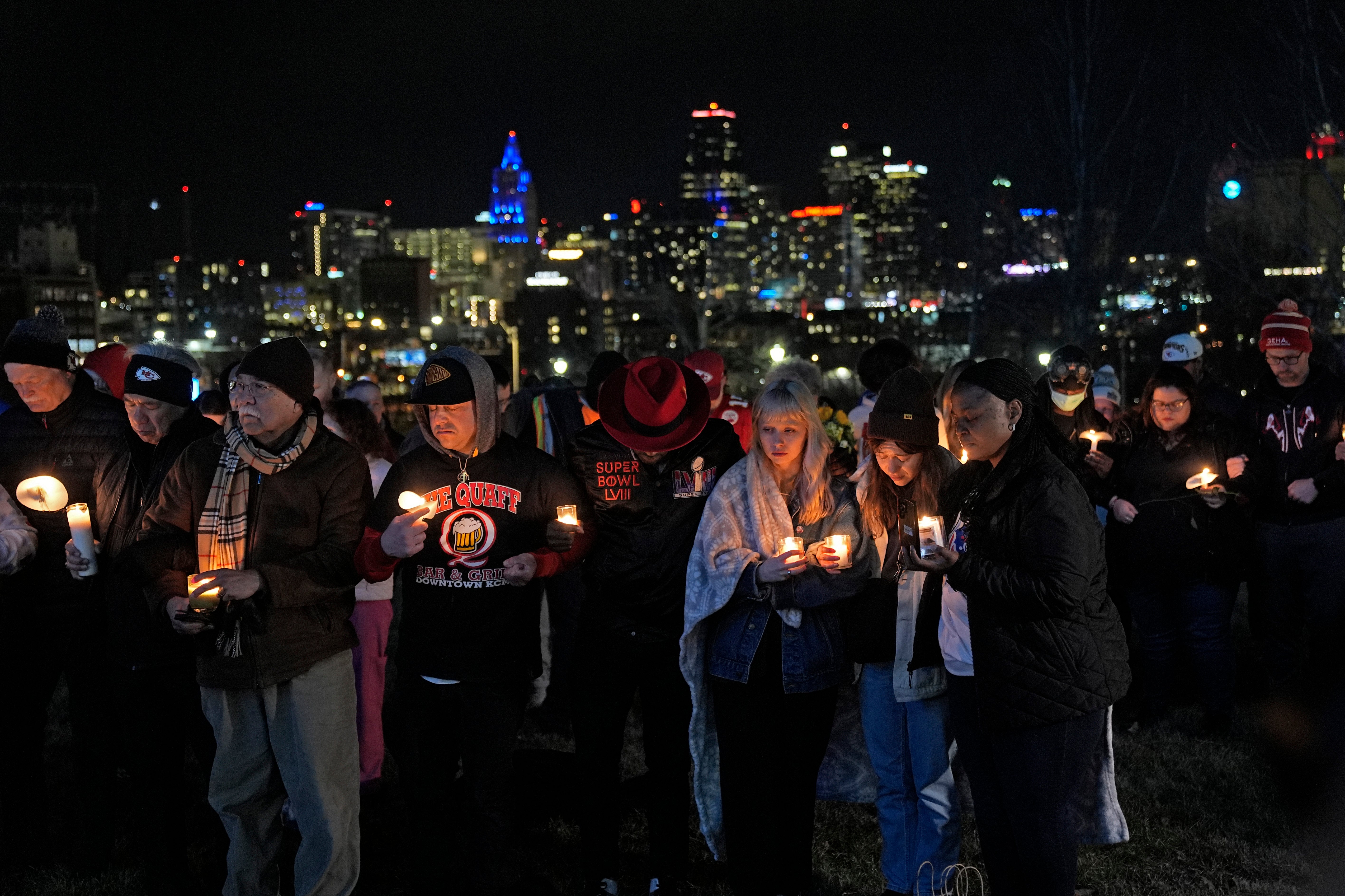People hold candles at the Kansas City, Missouri vigil for victims of the shooting on Wednesday