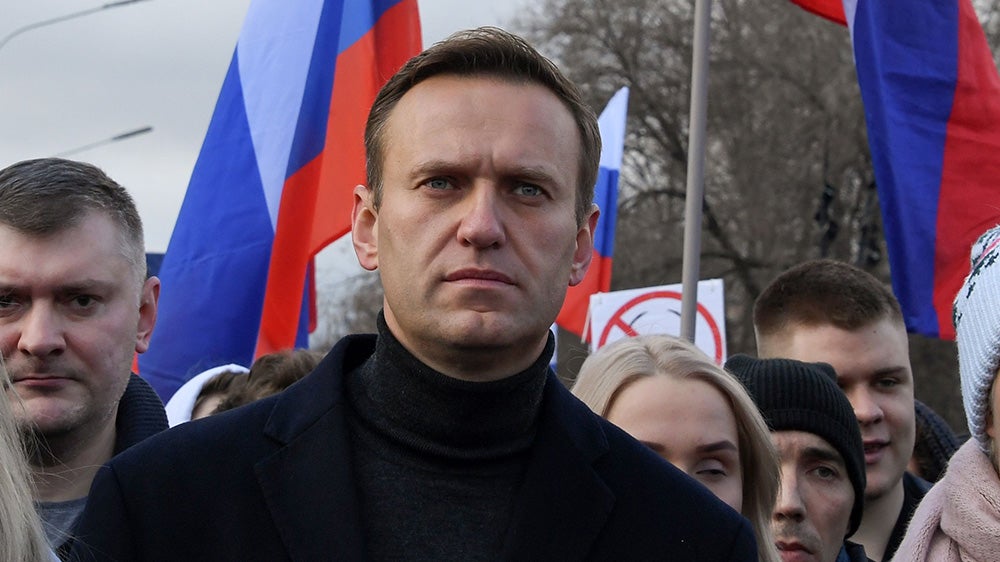 Navalny, opposition politician Lyubov Sobol and other demonstrators take part in a march in memory of murdered Kremlin critic Boris Nemtsov