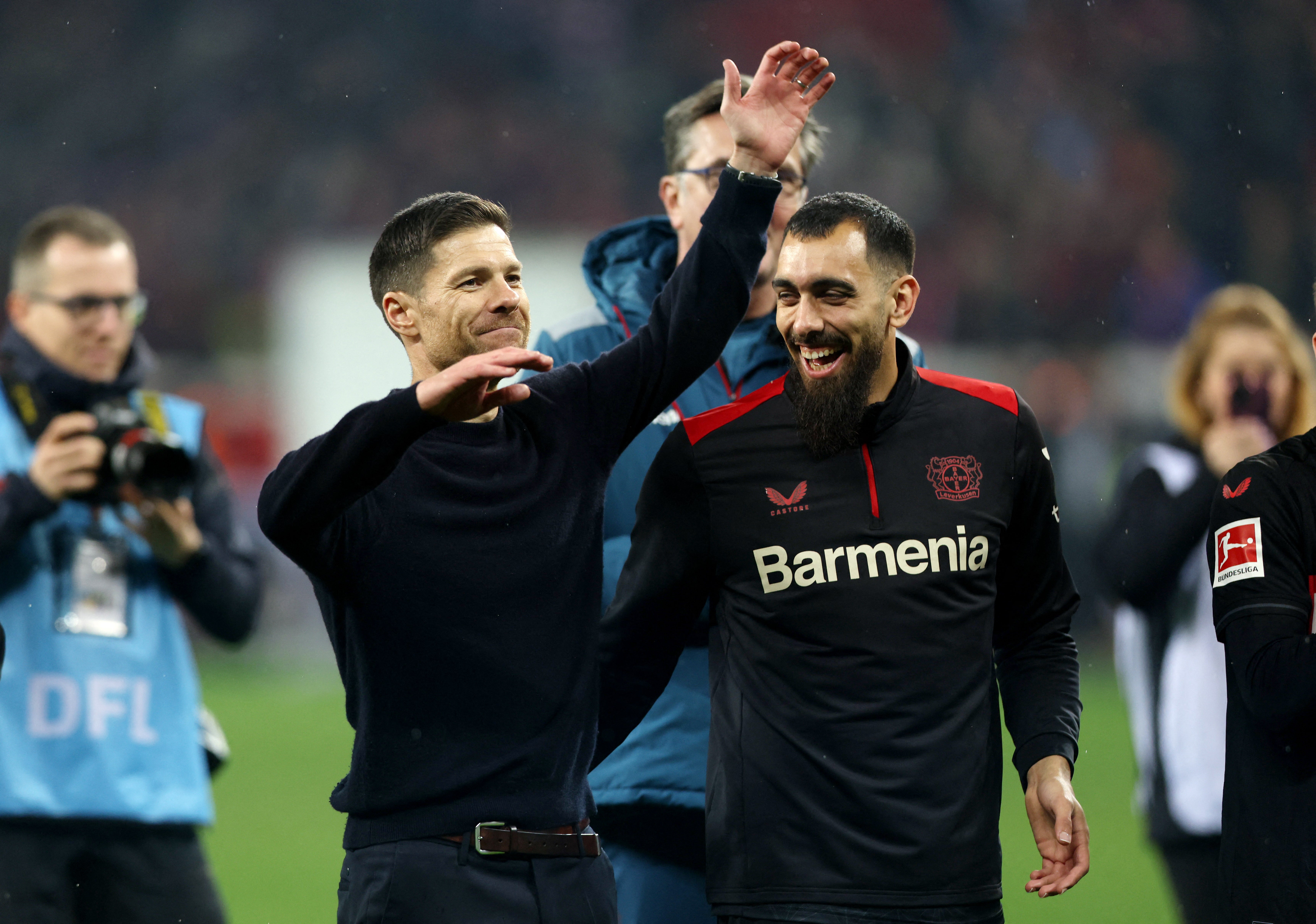 Alonso celebrated with his team after orchestrating Bayer Leverkusen’s 3-0 victory over Bayern Munich