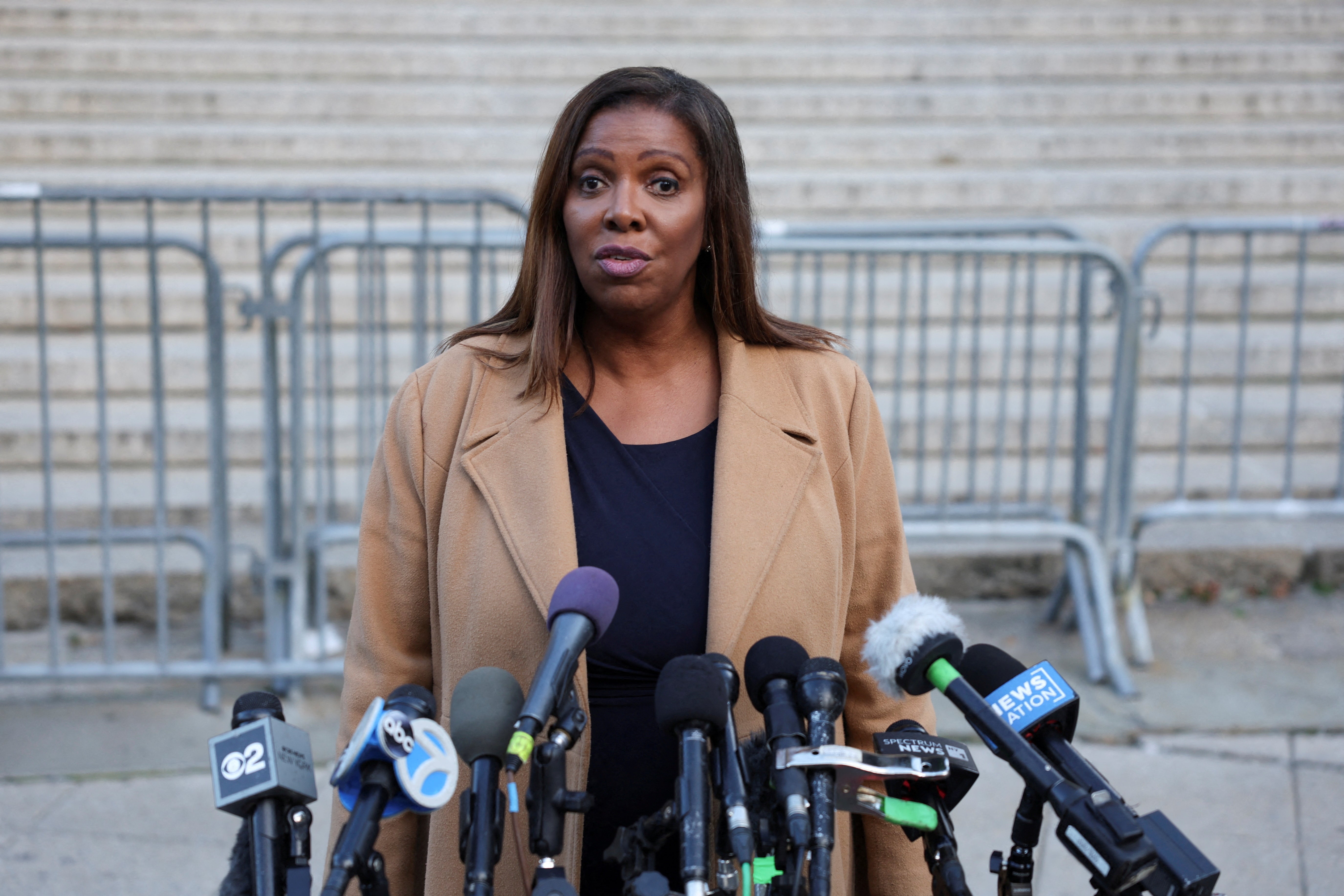 New York Attorney General Letitia James speaks to reporters outside New York County Superior Court on 25 October, 2023.
