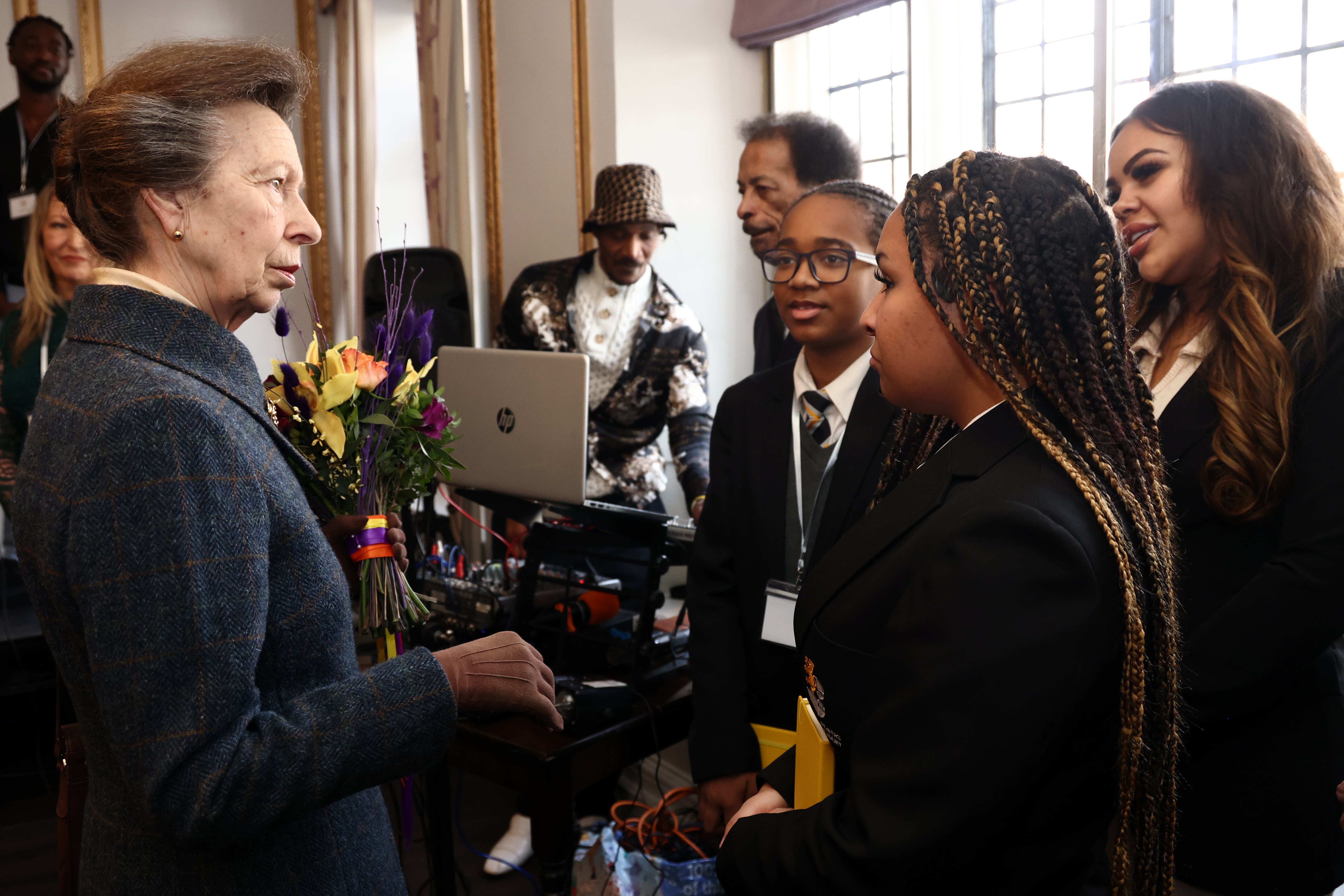 The Princess Royal talks to schoolchildren during a visit to the Off the Streets knife crime community group in Wellingborough, Northamptonshire (Darren Staples/PA)