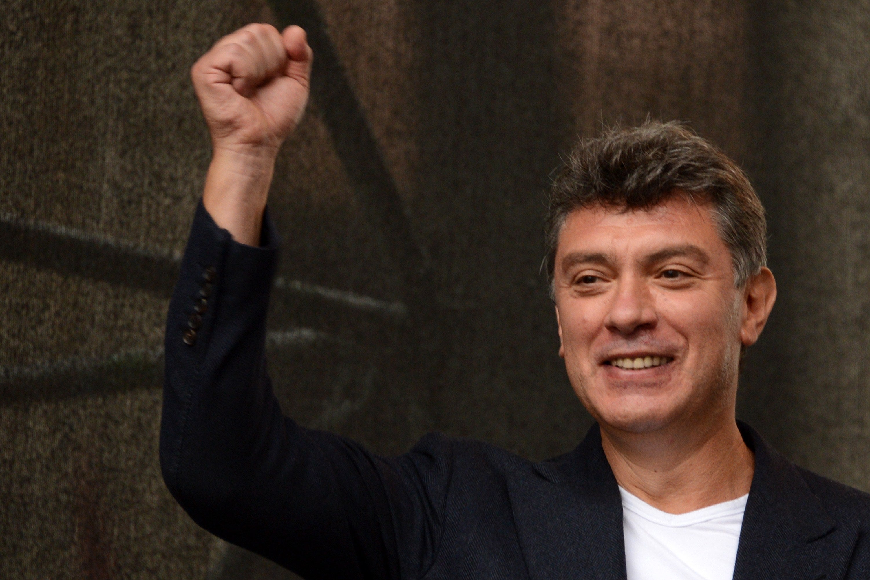 Former first deputy prime minister Boris Nemtsov, who was killed at the age of 55, gestures during an anti-Putin protest in central Moscow, on September 15, 2012