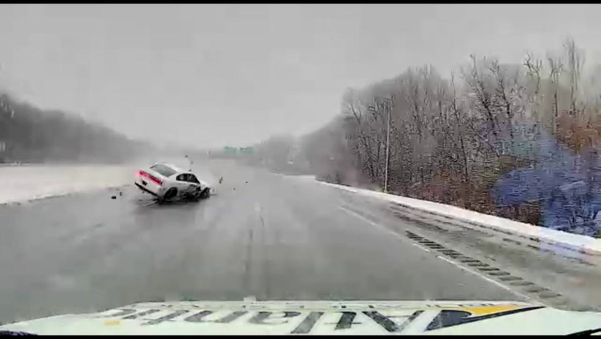 Ambulance narrowly avoids collision with out-of-control car in Massachusetts