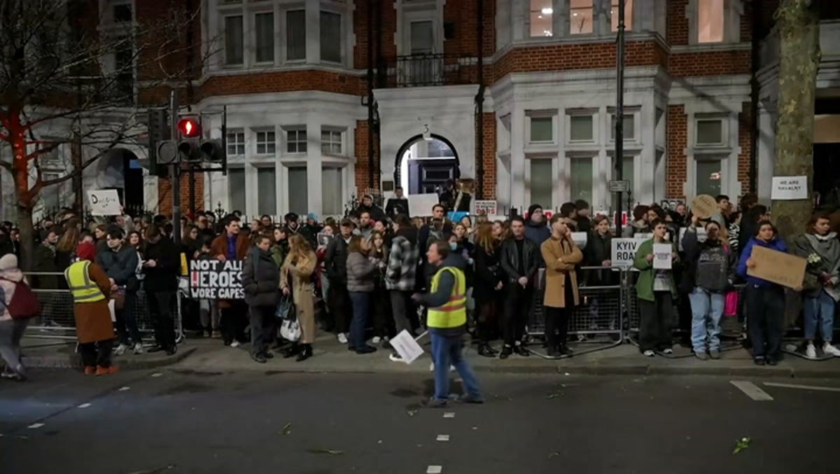 Crowds gather at Alexei Navalny vigil outside Russian embassy in London