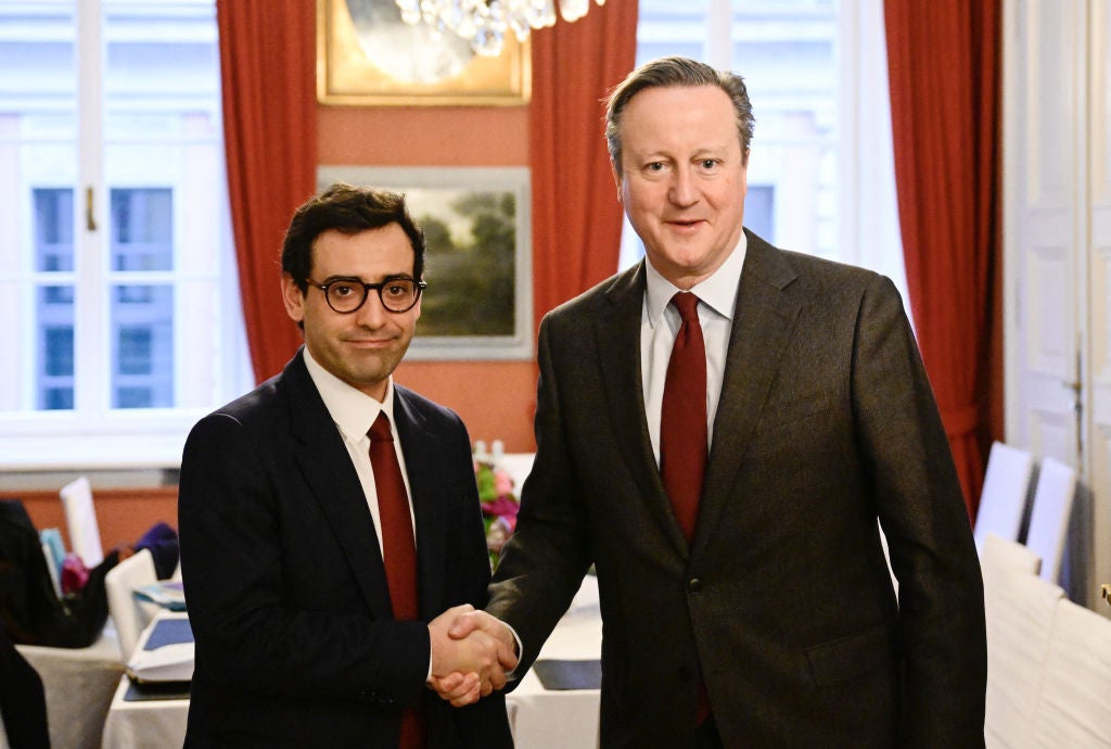 <p>France's Minister for Foreign and European Affairs Stephane Sejourne (L) and Britain's Foreign Secretary David Cameron shake hands ahead of their bilateral meeting on the sidelines of the Munich Security Conference </p>