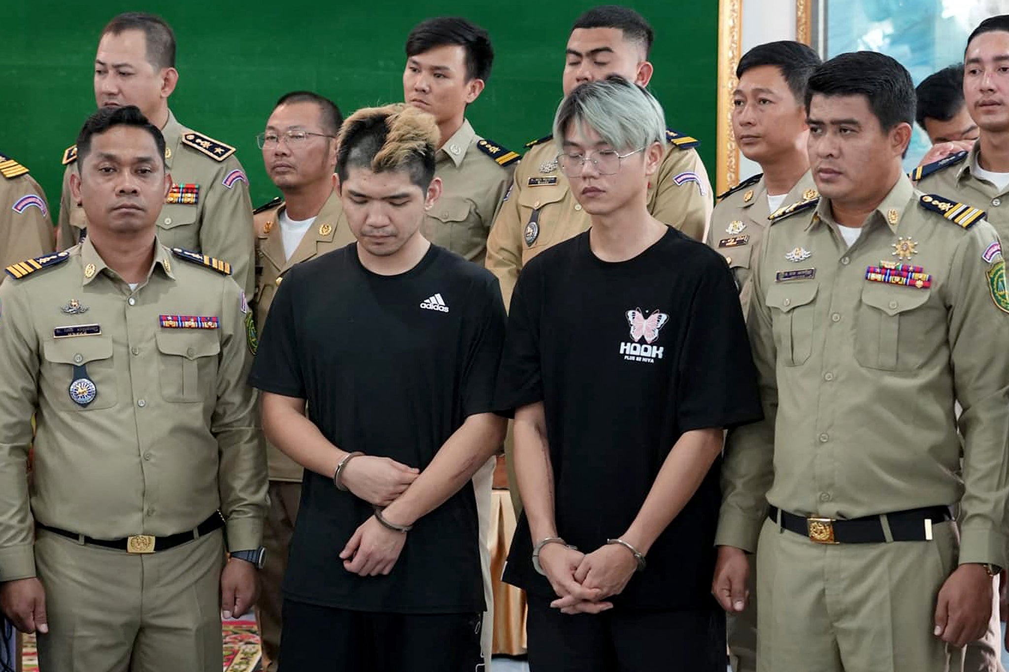 Taiwanese influencers after they were arrested for streaming video of a fake kidnapping