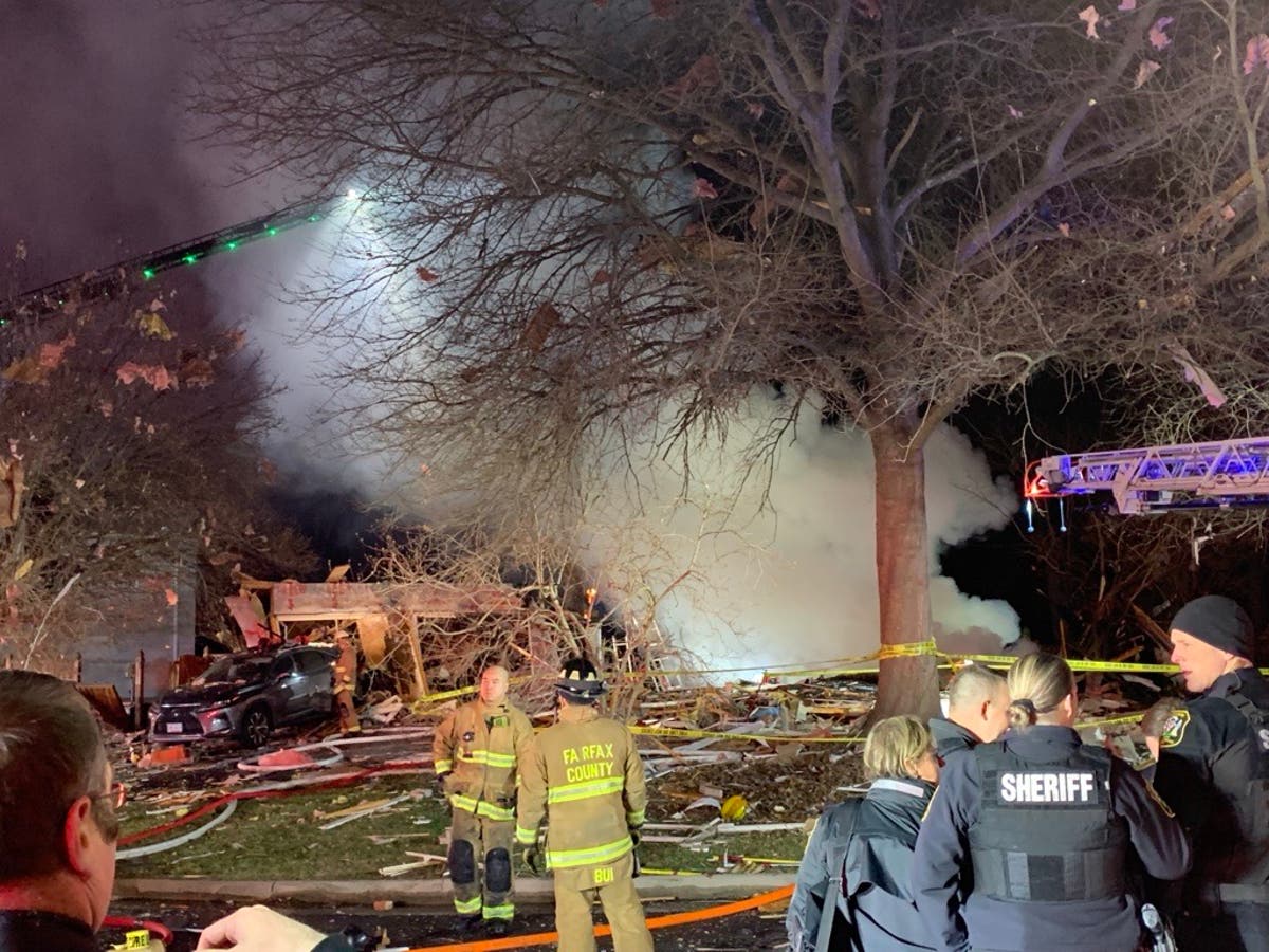 Firefighter killed and 12 people injured by massive explosion at Virginia home