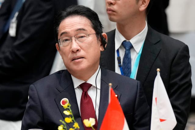 <p>Japan’s prime minister Fumio Kishida listens to a speaker at the 50th anniversary of the ASEAN-Japan Friendship and Cooperation luncheon meeting in Tokyo </p>