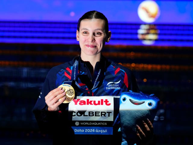 <p>Freya Colbert of Great Britain poses after winning the gold medal in the Women’s 400m Individual Medley final at the World Aquatics Championships</p>