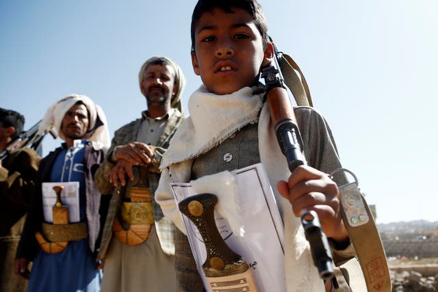 <p>A Yemeni child carries a rifle as he participates with Houthi followers in a rally staged in solidarity with Palestinians </p>