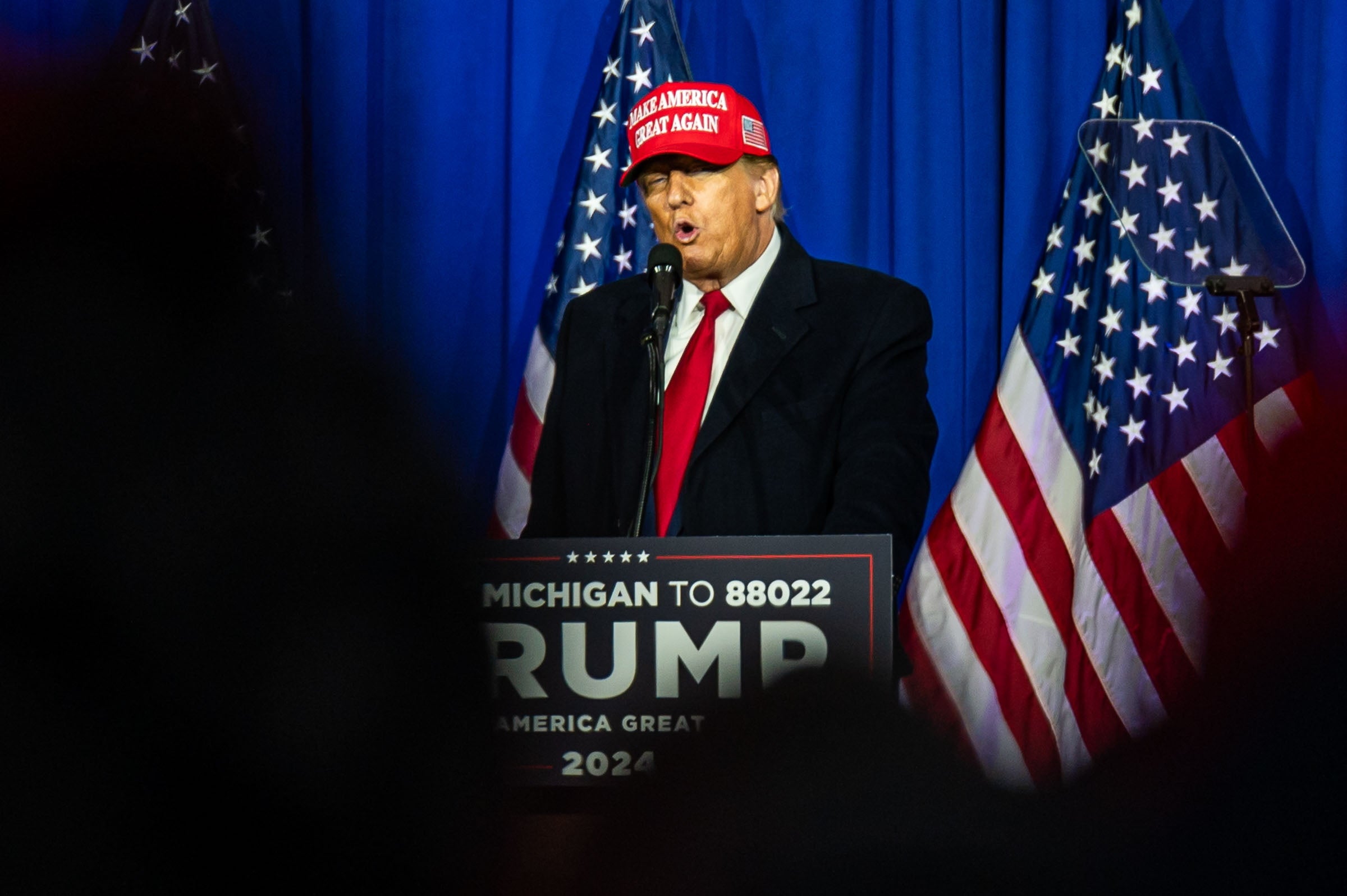 Donald Trump speaks to supporters in Michigan on 17 February, one day after a New York judge delivered a financially crushing verdict against him after a sprawling civil fraud case