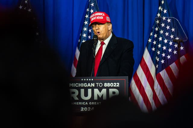 <p>Donald Trump speaks to supporters in Michigan on 17 February, one day after a New York judge delivered a financially crushing verdict against him after a sprawling civil fraud case</p>
