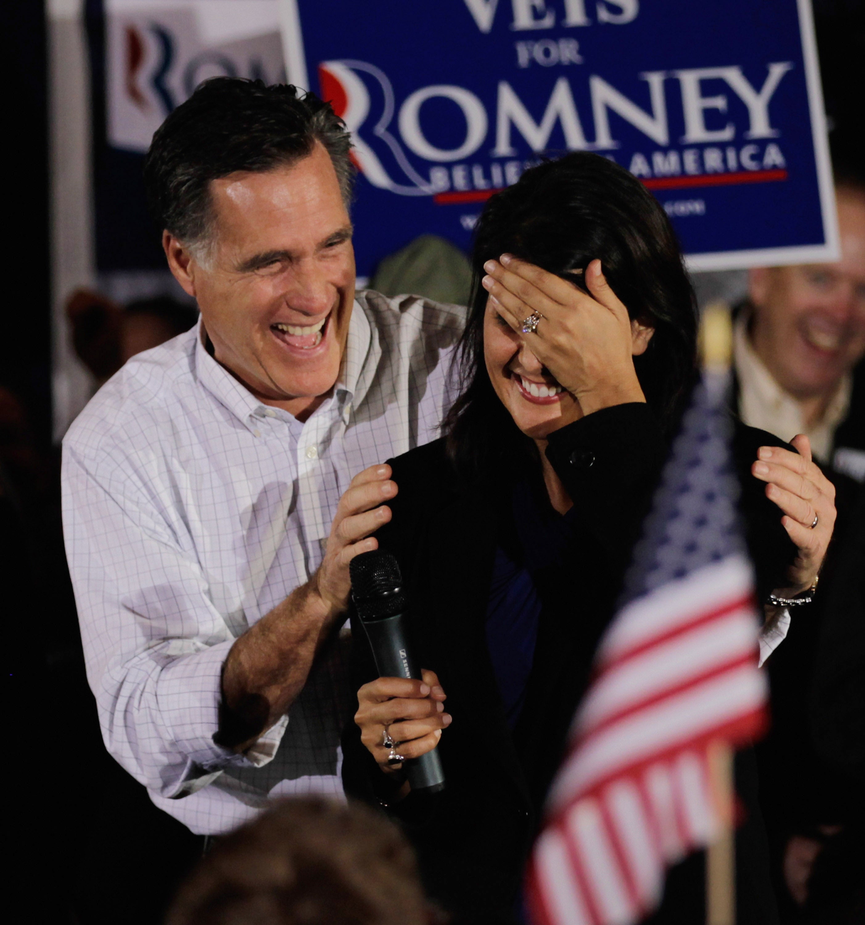 Republican presidential candidate, former Massachusetts Gov. Mitt Romney gives a birthday cake to South Carolina Gov. Nikki Haley during a campaign rally at Charleston Area Convention Center on January 20, 2012 in North Charleston, South Carolina