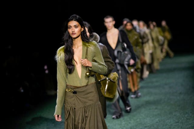 <p>A model wears a creation for the Burberry Winter 2024 fashion show</p>