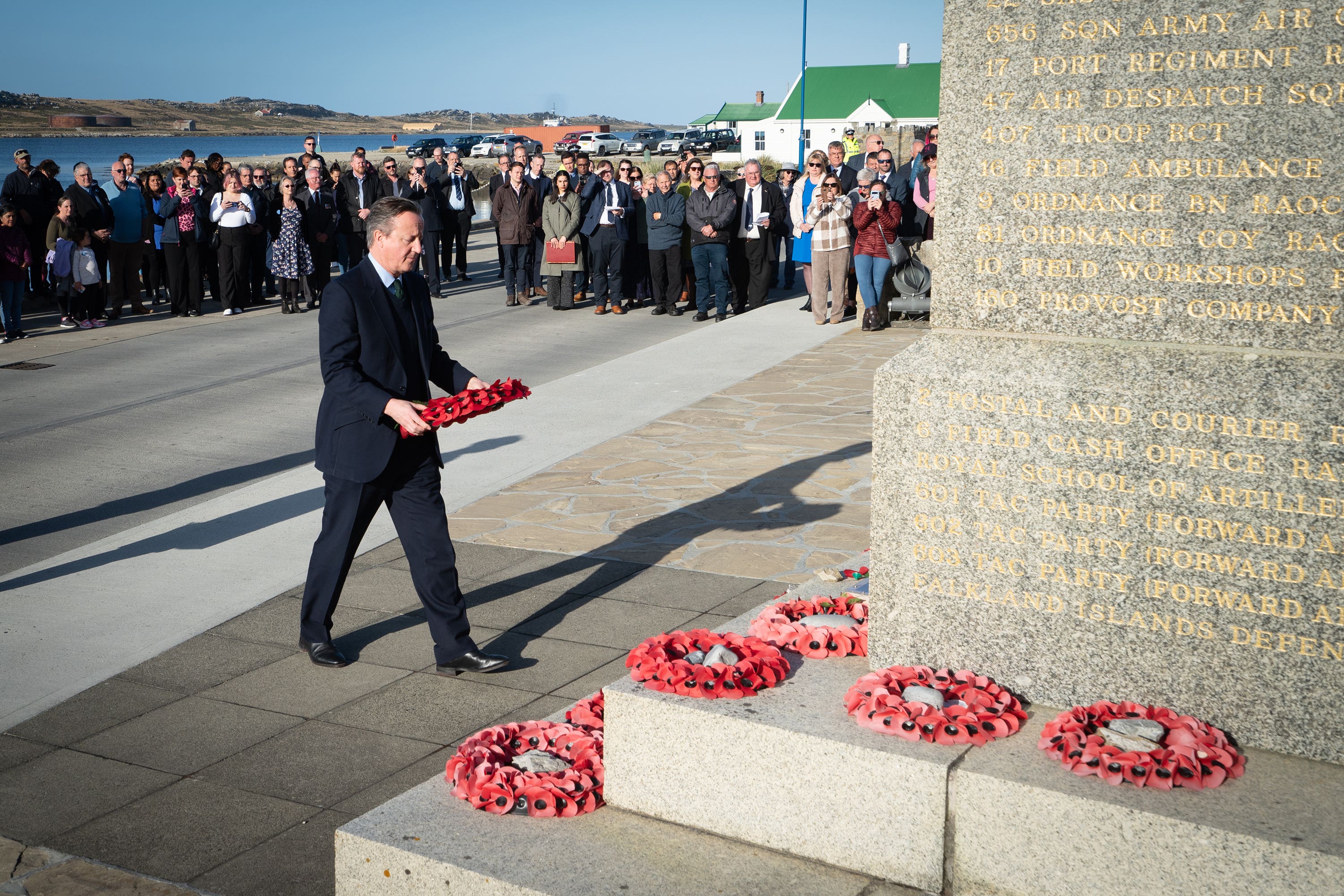 Foreign Secretary Lord David Cameron attends a wreath laying ceremony at the Falklands conflict memorial in Port Stanley on the Falkland Islands (Stefan Rousseau/PA)
