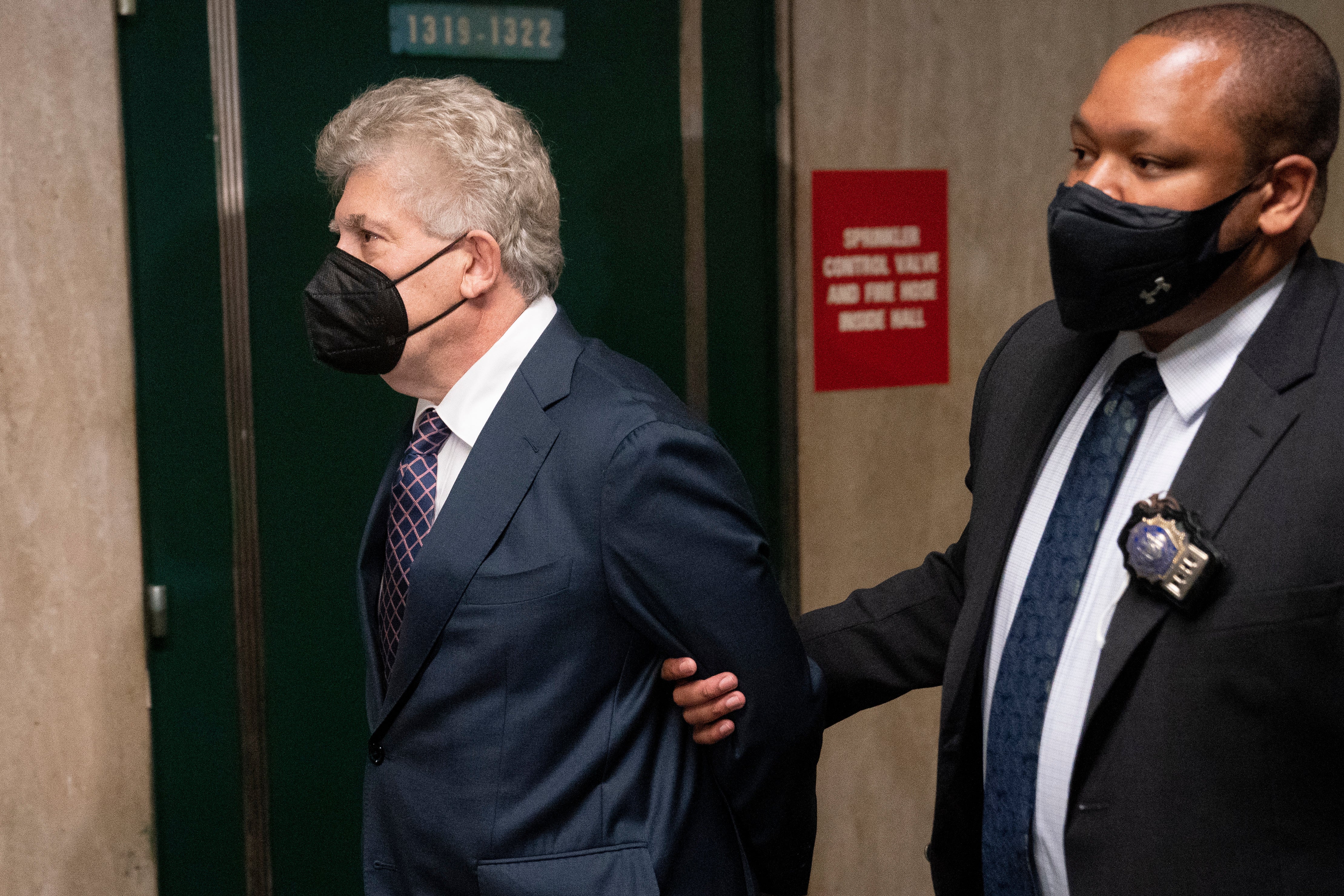 Glenn Horowitz, left, arrives to criminal court after being indicted for conspiracy involving handwritten notes