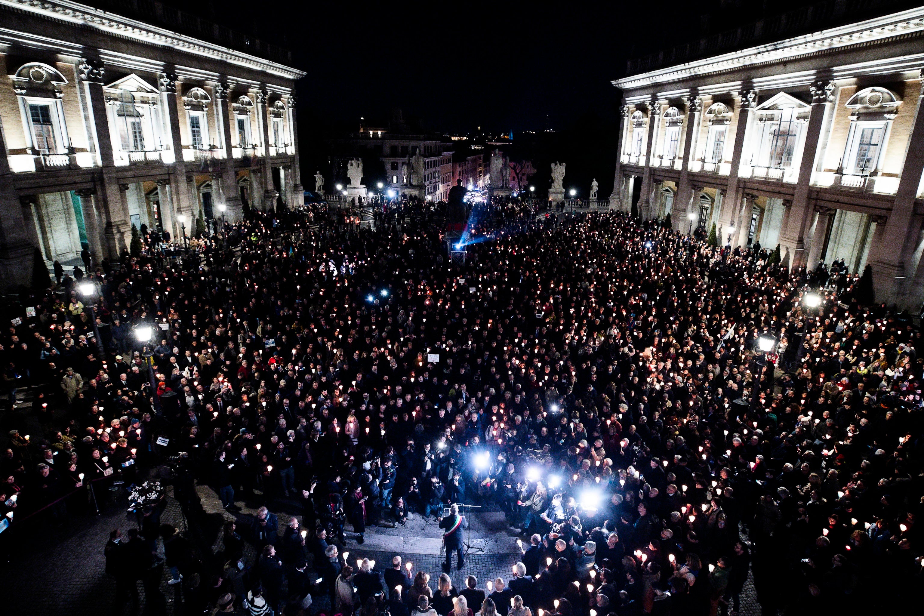 <p>Torchlight procession in memory of Russian opposition leader Alexei Navalny in Rome</p>