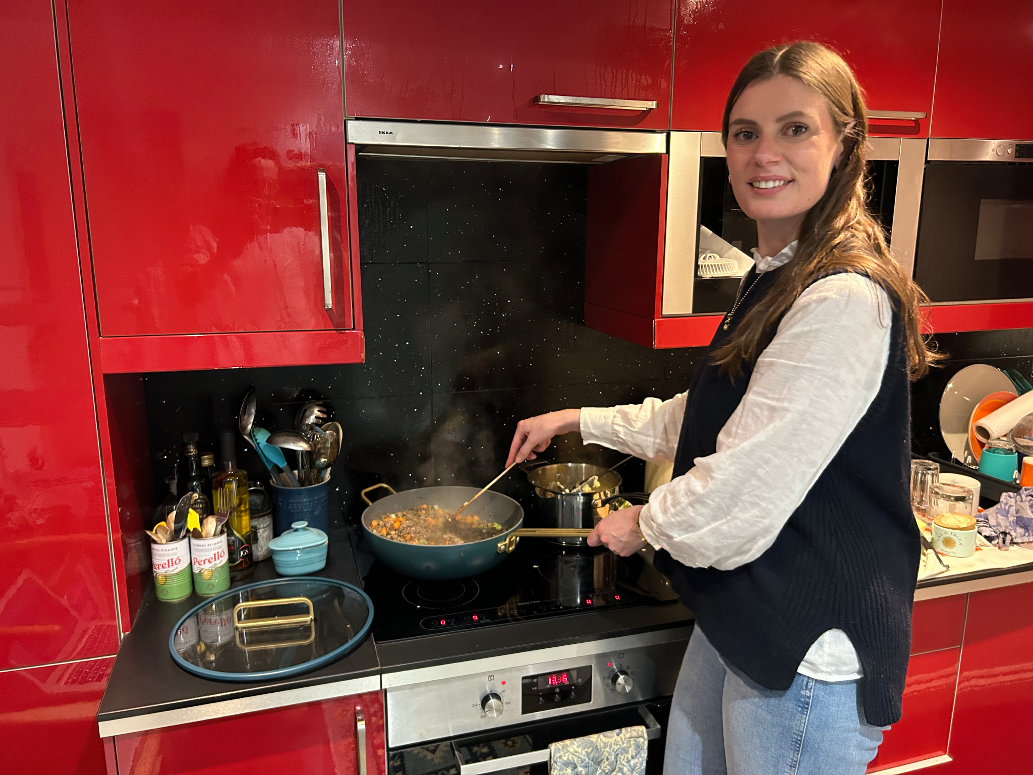 Emma putting the pan through its paces by whipping up some delicious recipes