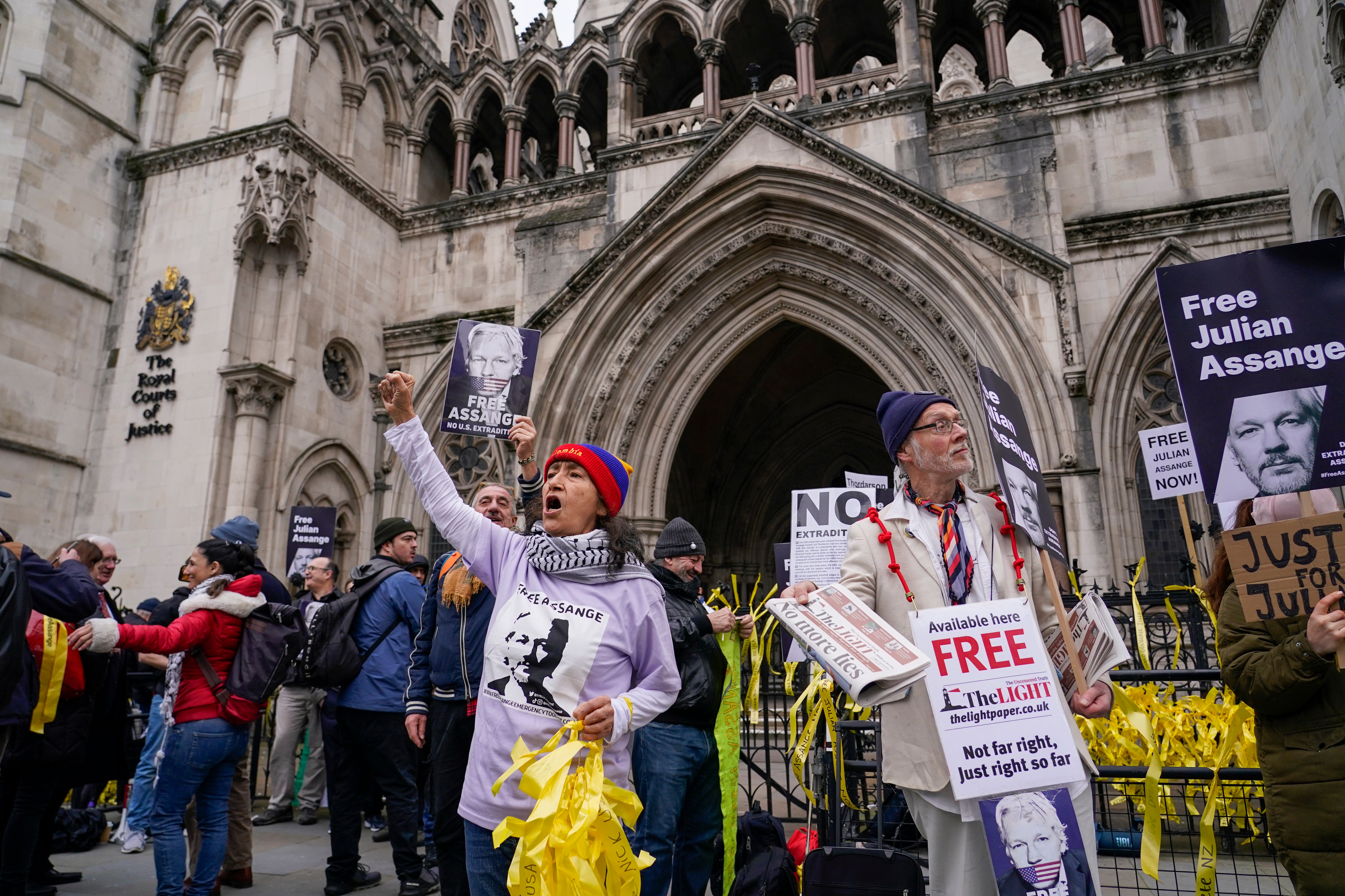 Protesters chant in support of Julian Assange ahead of his appeal hearing at the Royal Courts of Justice on Tuesday