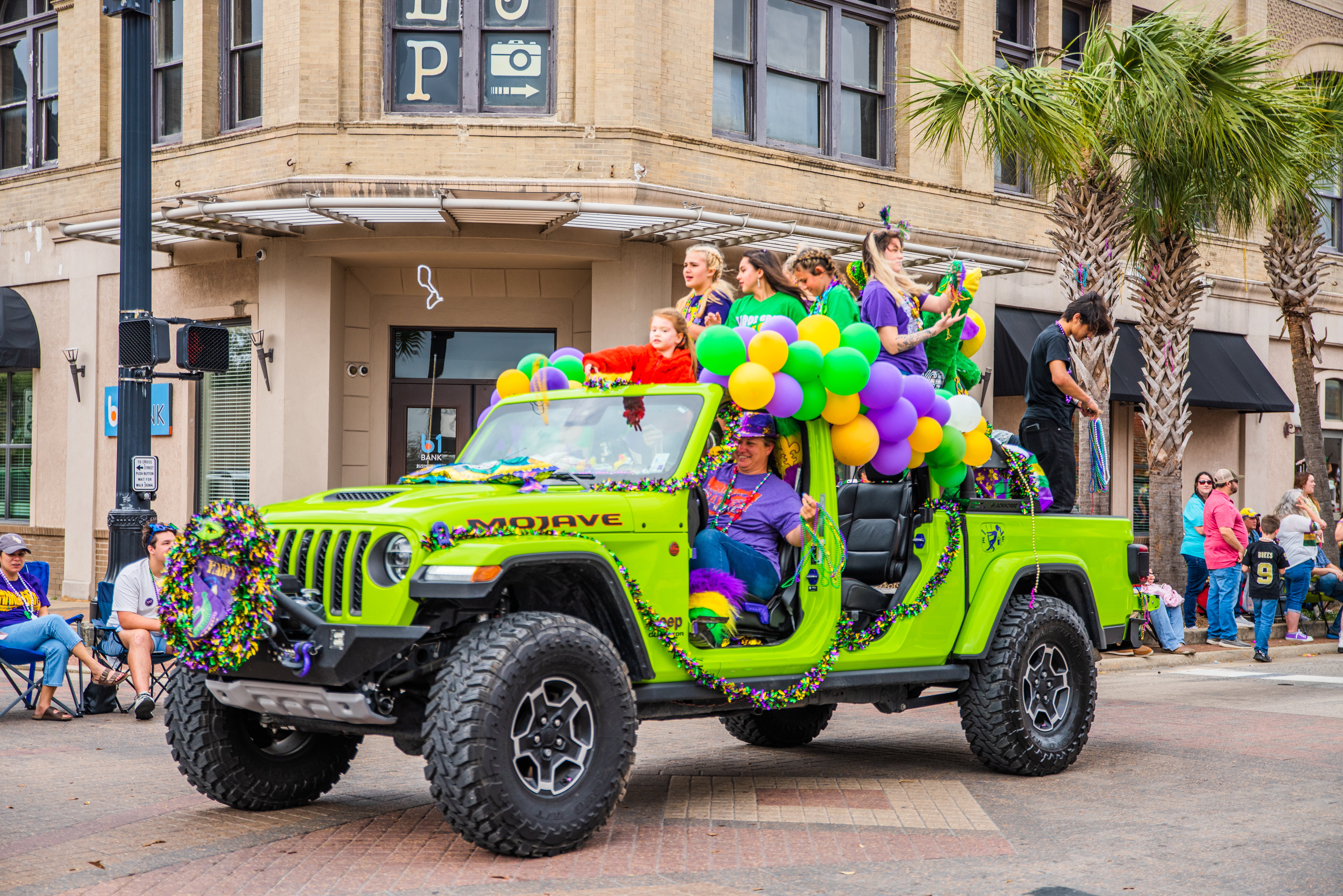 Participants in the Lake Charles Mardi Gras jeep parade