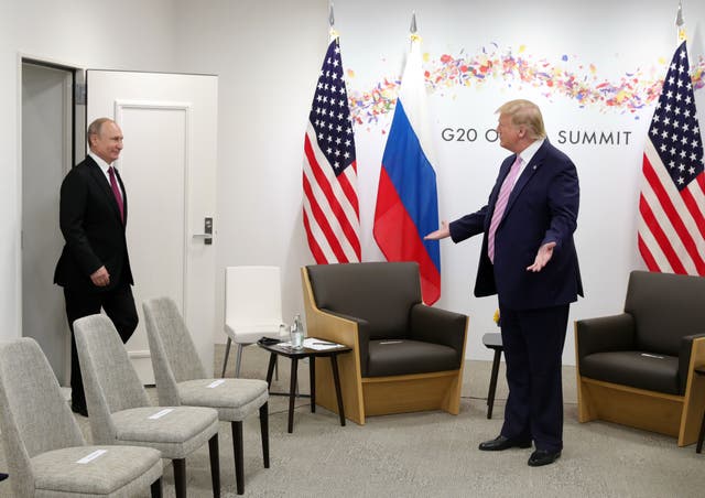 <p>Russian President Vladimir Putin arrives for a meeting with US President Donald Trump on the sidelines of the G20 summit in Osaka on 28 June 2019</p>