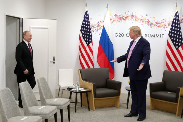 <p>Russian President Vladimir Putin arrives for a meeting with US President Donald Trump on the sidelines of the G20 summit in Osaka on 28 June 2019</p>