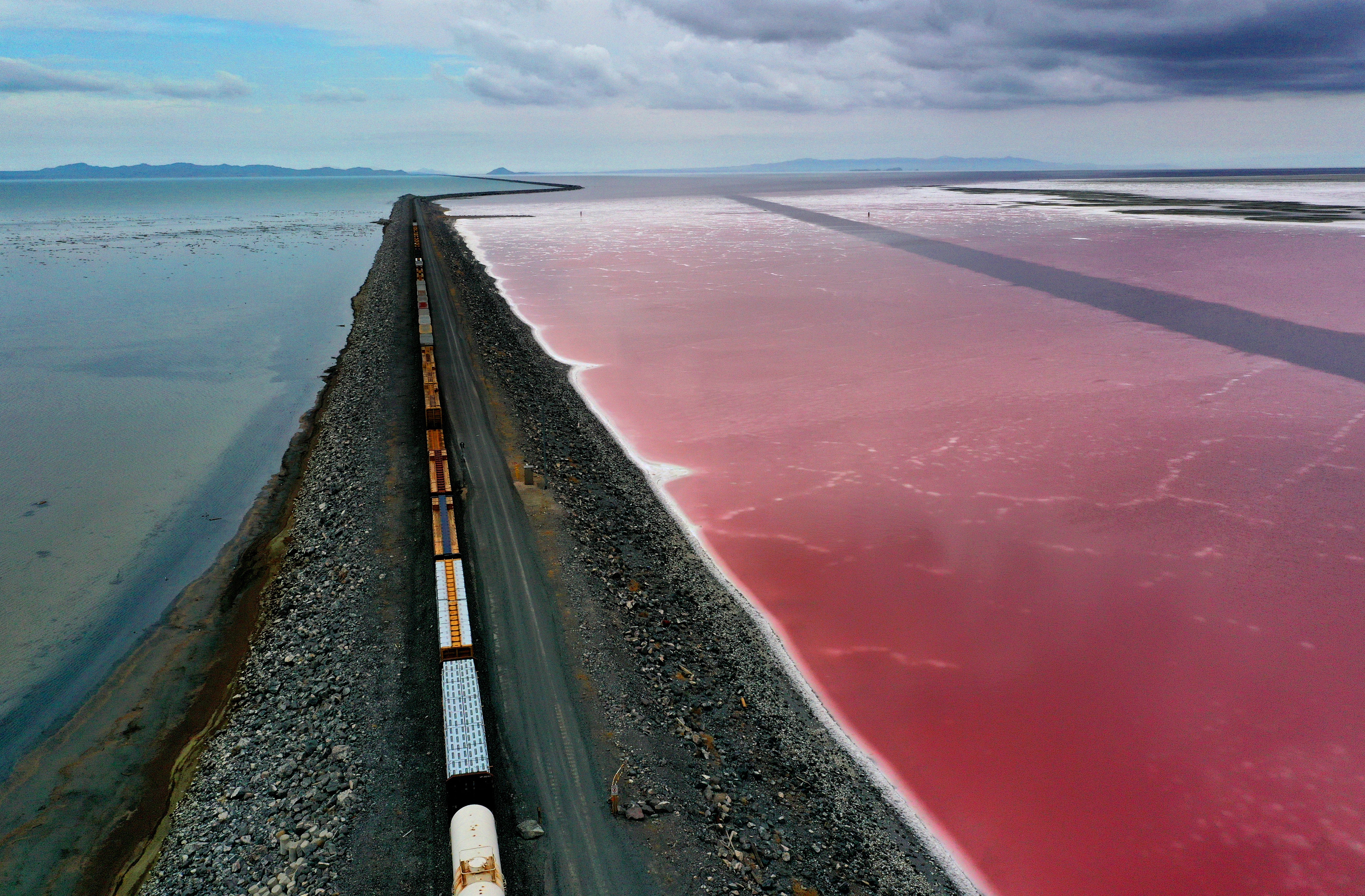A railroad causeway divides the Great Salt Lake in August 2021 near Corinne, Utah. As severe drought continues to take hold in the western United States, water levels at the Great Salt Lake, the largest saltwater lake in the Western Hemisphere, have dropped to the lowest levels ever recorded