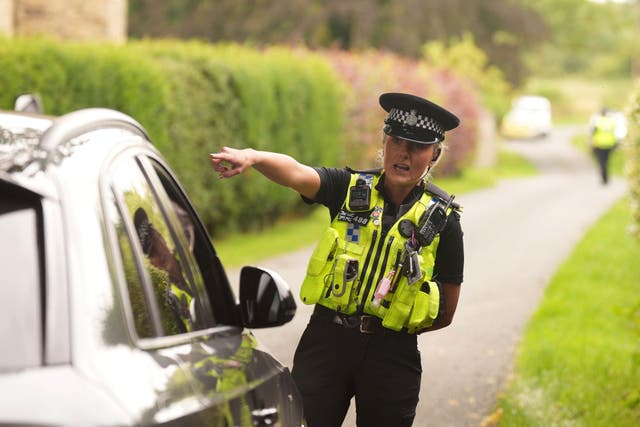 Police near Prime Minister Rishi Sunak’s house in Richmond, North Yorkshire after Greenpeace activists climbed onto its roof (Danny Lawson/PA)