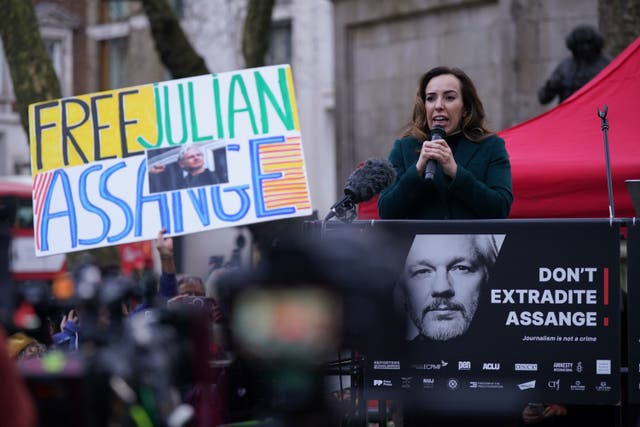<p>Stella Assange took to the stage outside the High Court  </p>
