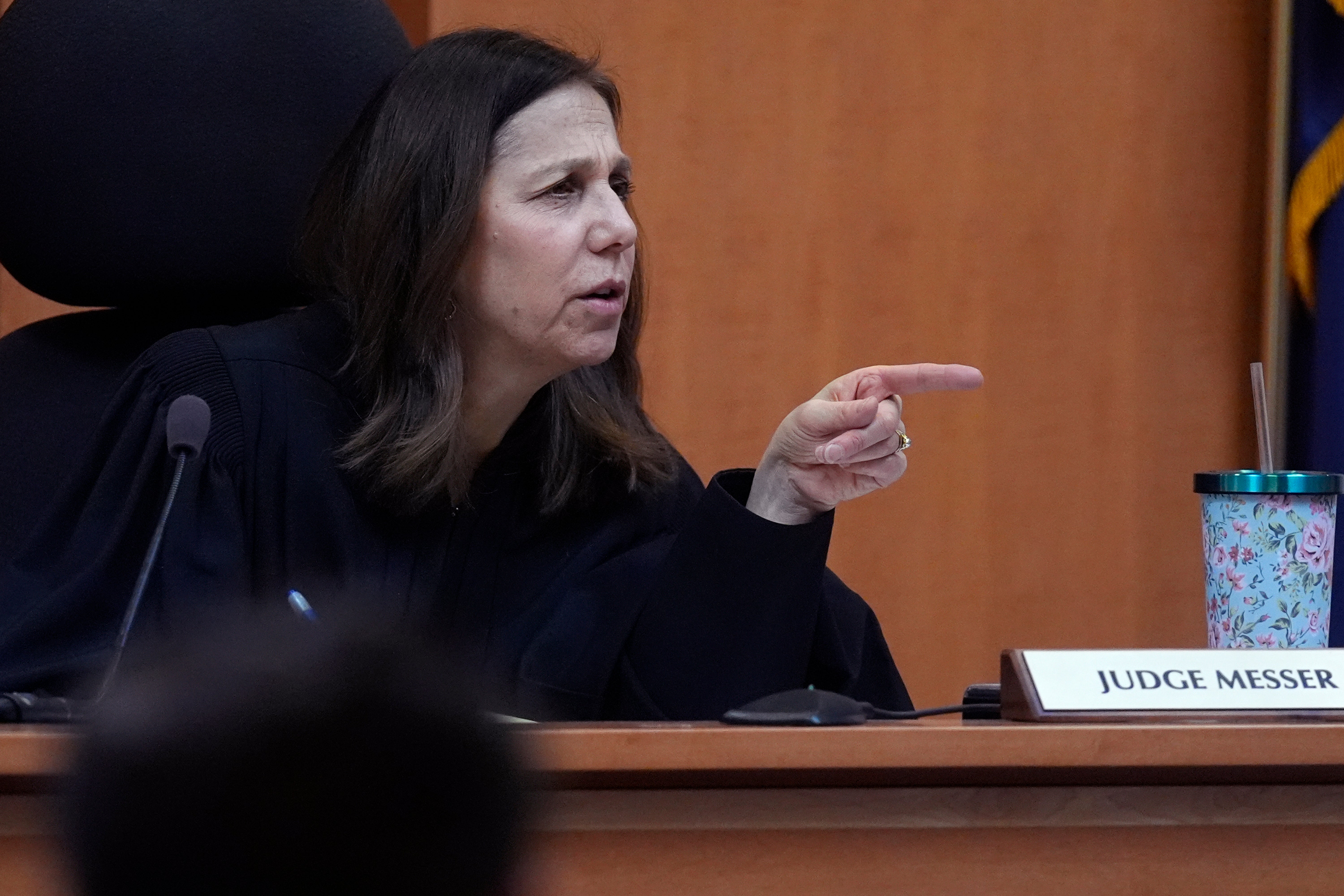 Judge Amy Messer addresses defense and prosecution attorneys during the trial of the Adam Montgomery