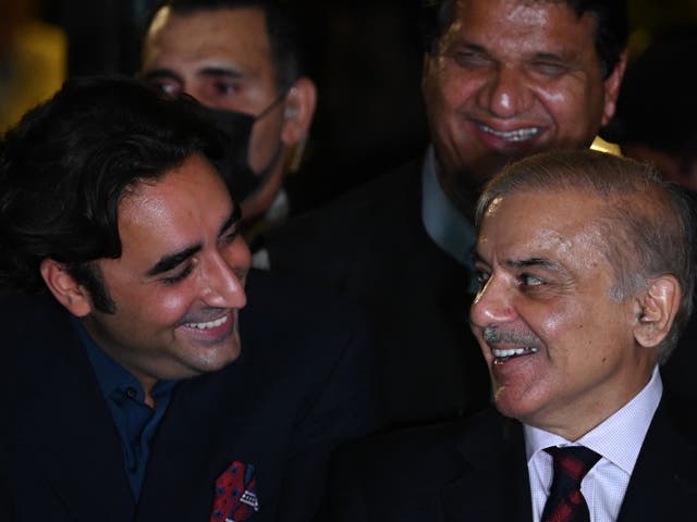 <p>Shehbaz Sharif (right) and Bilawal Bhutto Zardari smile during a press conference with other party leaders in Islamabad on 7 April 2022. Their two parties, PML-N and PPP, have decided to join together to form a federal government in Pakistan</p>