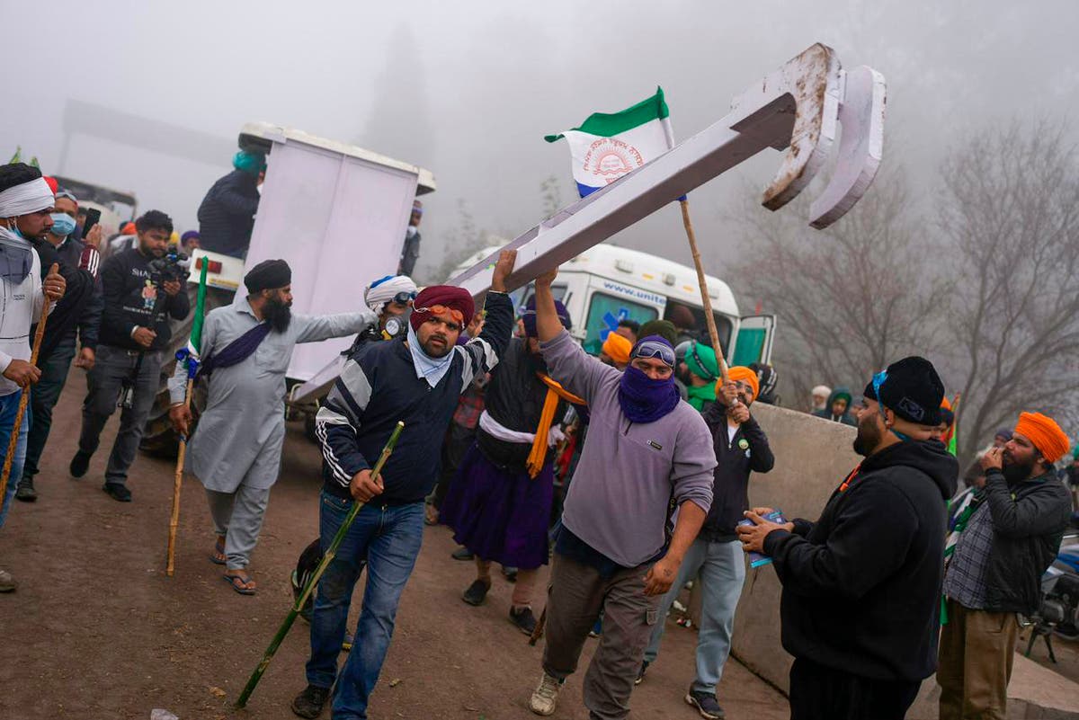 Police fire teargas as Indian farmers resume protest march to New Delhi after talks fail